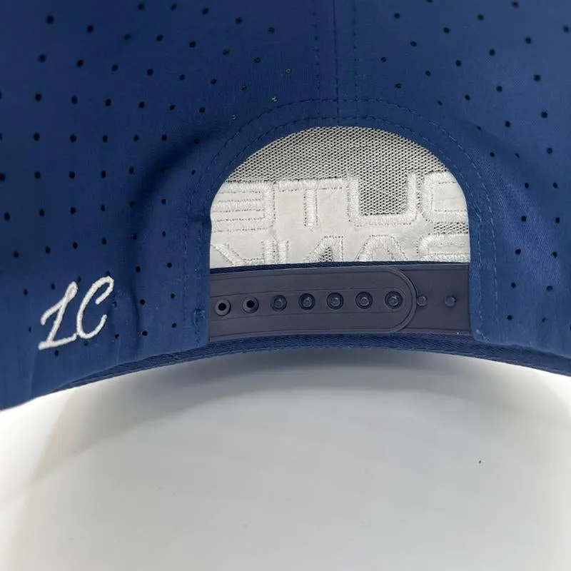 OBX Embroidery on a Blue Performance Hat with White Rope